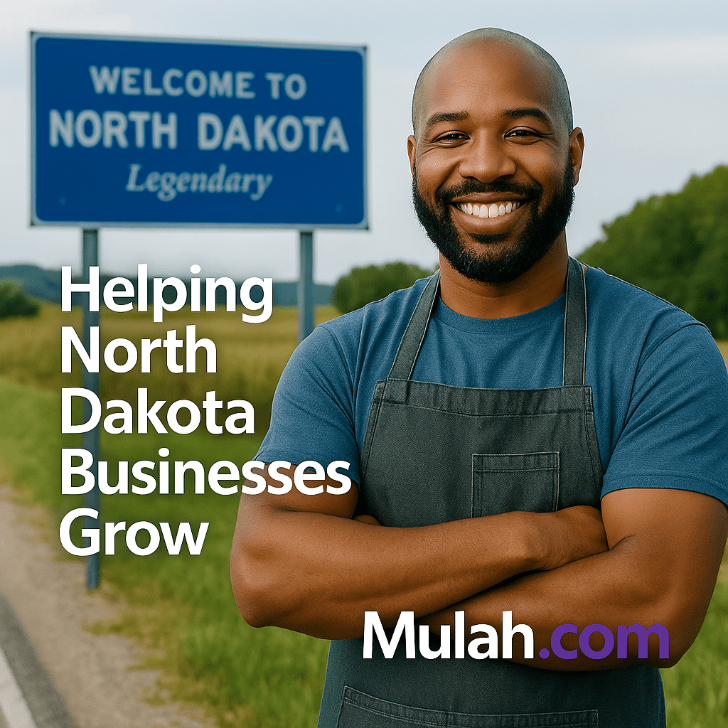 Smiling North Dakota small business owner standing in front of a Welcome to North Dakota sign with text overlay ‘Helping North Dakota Businesses Grow’ and Mulah.com logo.