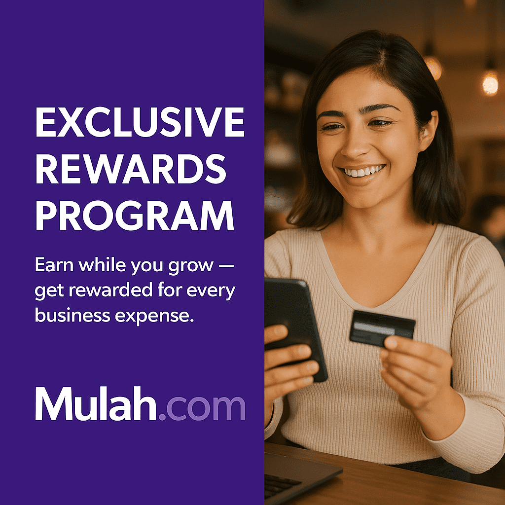 Smiling woman using her smartphone and holding a credit card in a café, beside text reading “Exclusive Rewards Program,” promoting Mulah.com’s business credit card rewards.