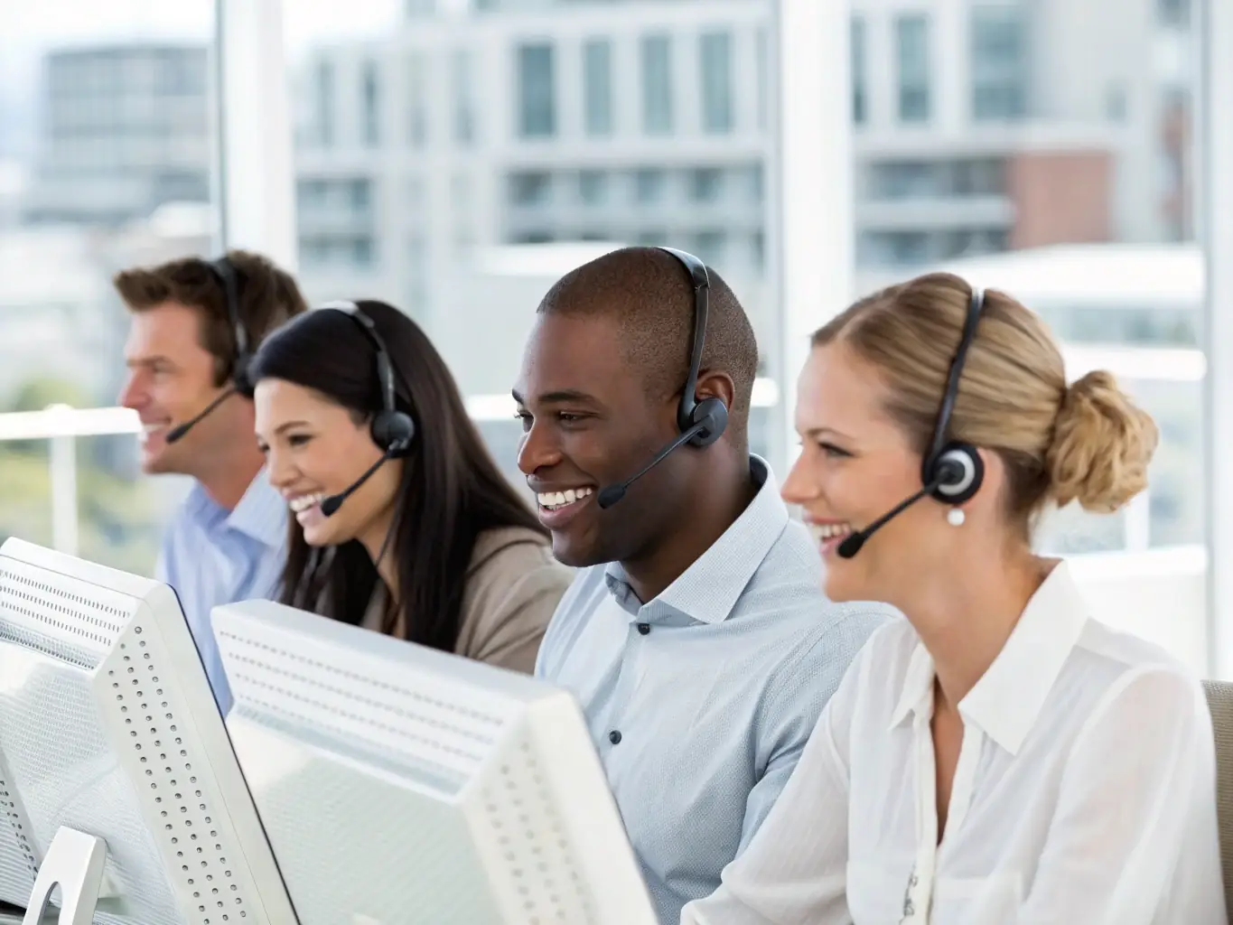 A professional call center environment with agents actively assisting customers, showcasing a busy and productive workspace, symbolizing the need for working capital.
