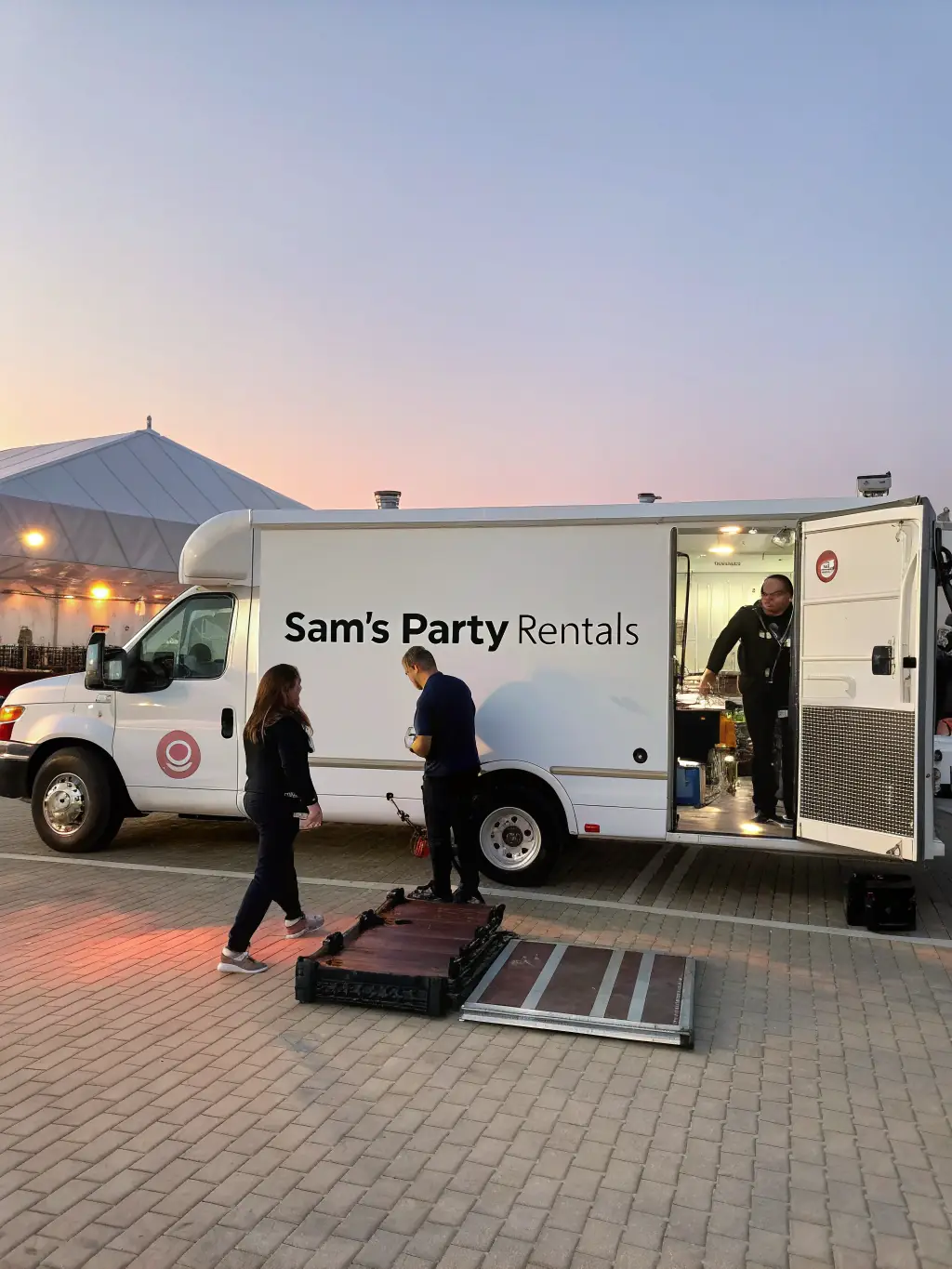 A delivery van branded with a flower shop's logo, parked outside a venue, symbolizing the ability to handle large events and deliveries with Mulah's support.