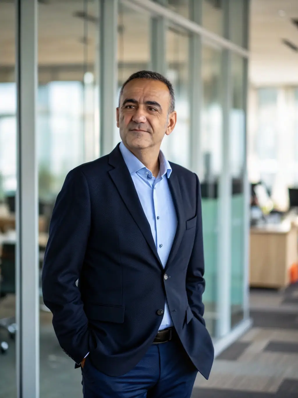 A professional distributor reviewing financial documents with a satisfied expression, symbolizing trust and reliability in financial partnerships.